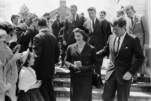 President John F. Kennedy and First Lady Jacqueline Kennedy depart Mass in Middleburg, VA.